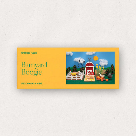 Puzzle box for 'Barnyard Boogie' with a colorful illustration of a barn and animals on a yellow background.