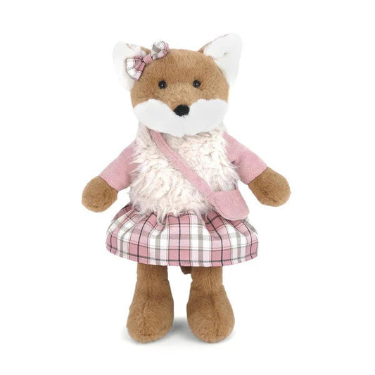 Plush fox toy wearing a pink dress with a white background