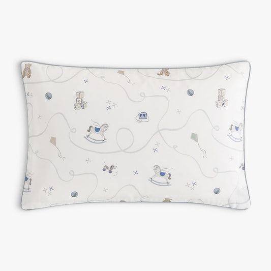 Children's pillow with rocking horse and teddy bear on a white background
