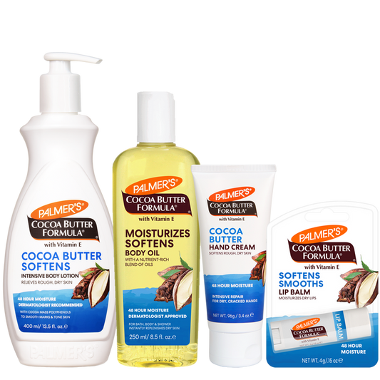 A Palmer's Cocoa Butter Formula skincare set featuring a body lotion pump bottle, a body oil bottle, a hand cream tube, and a lip balm tube, all displayed together on a plain white background.