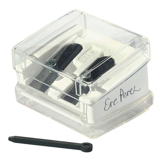White plastic pencil sharpener with clear lid and carbon steel blades with Ere Perez branding on white background.