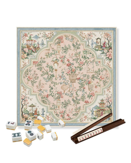Square floral game table mat with light blue border and pink, green, beige center design