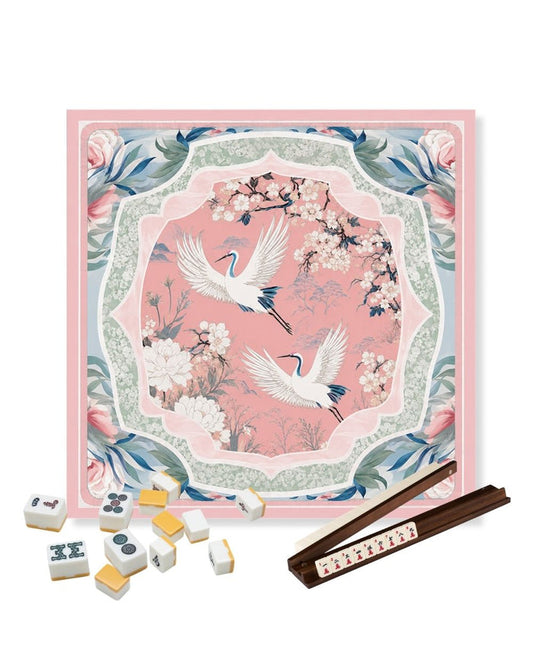 Square table mat with pink crane and floral print, decorative border, non-slip base