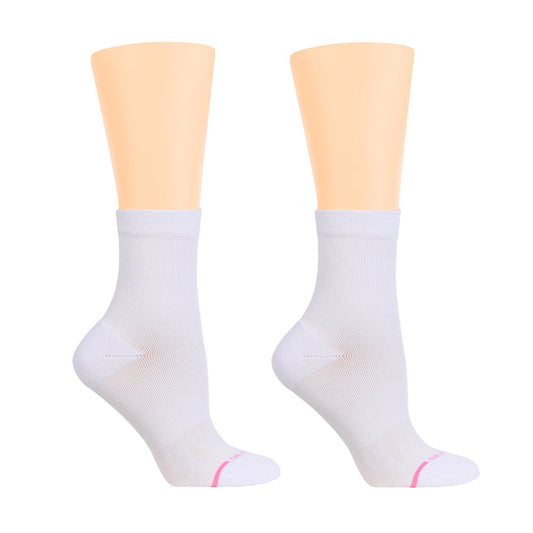 White mid-crew compression socks with a pink accent at the toe, displayed on mannequin legs.