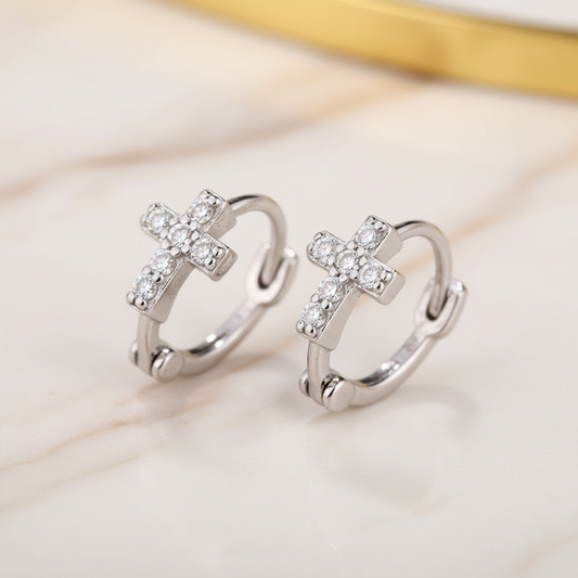 Cross hoop earrings - prominent angled view